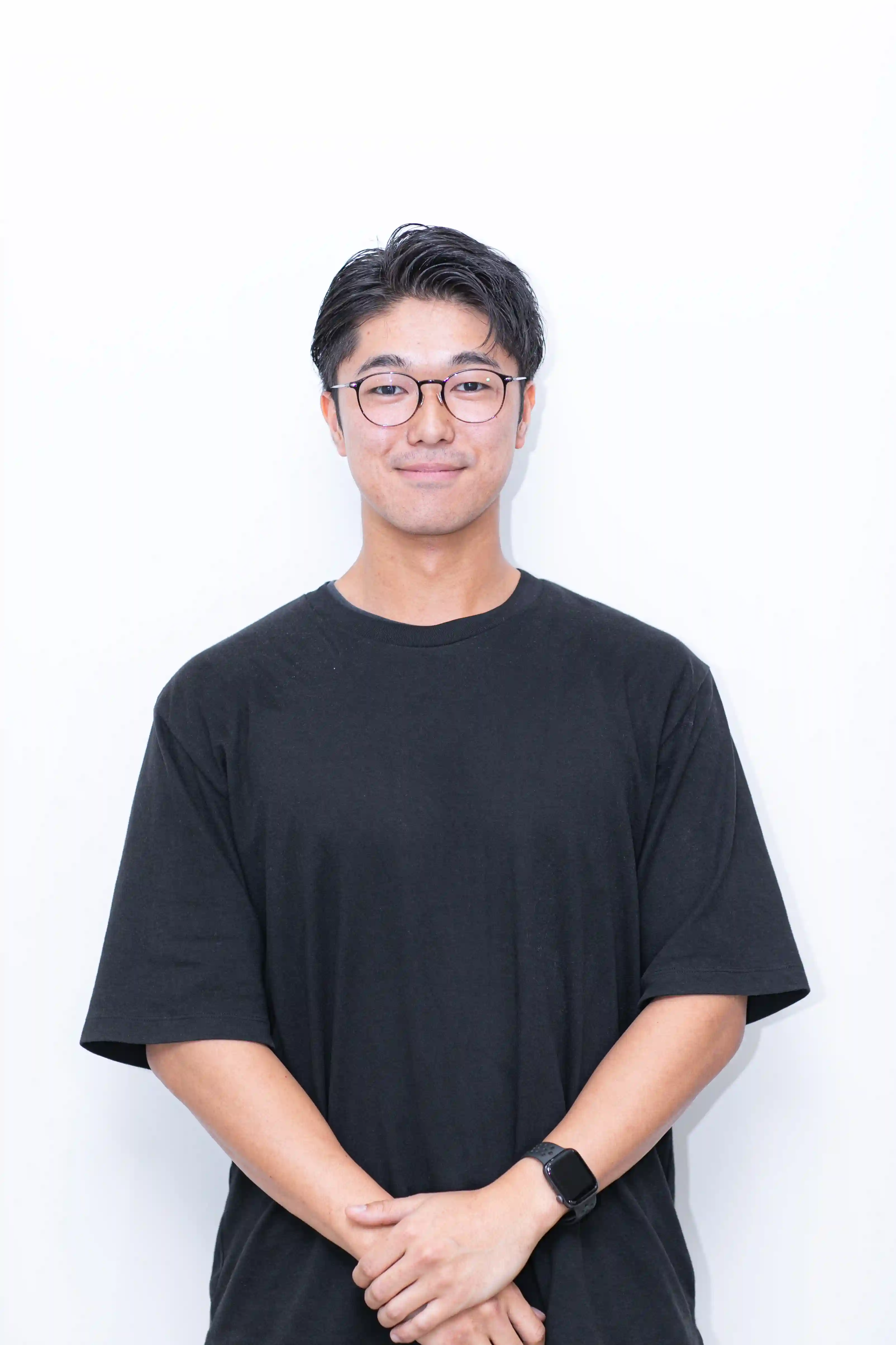 南行徳エリアの完全個室パーソナルジム REVOISTを担当するトレーナー、佐藤譲のプロフィール画像。